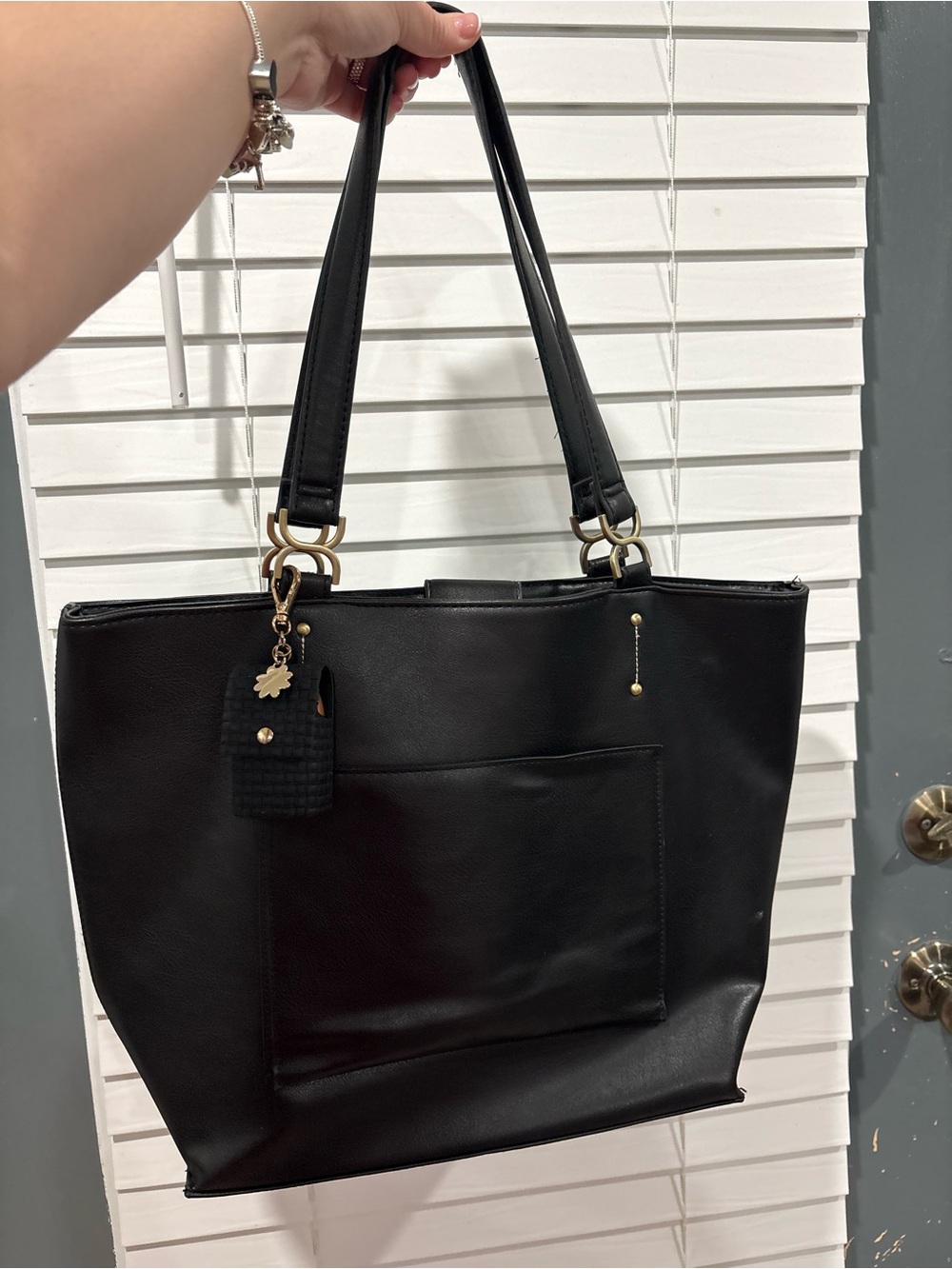 Classic Black Tote with Front Pocket and Gold Accents